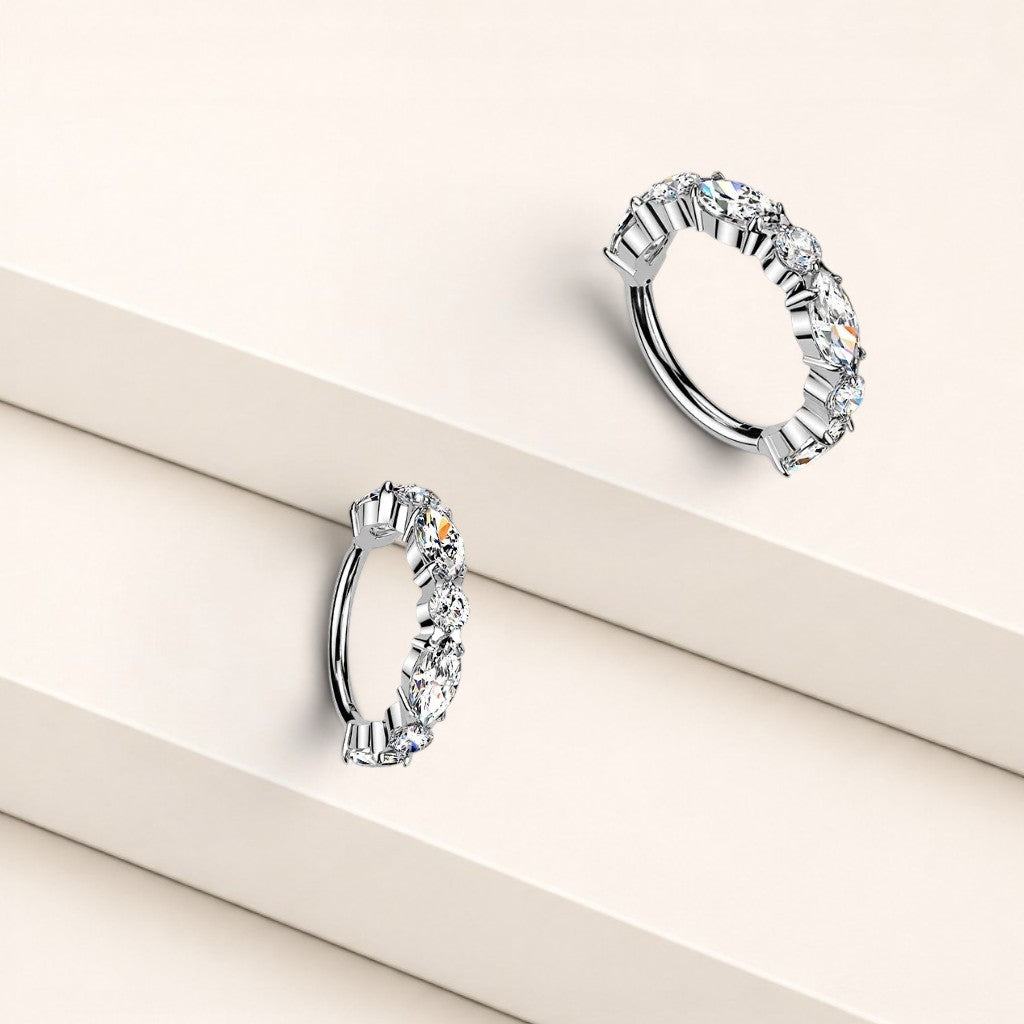 MKBodyJewelry silver titanium nose clicker ring with sparkling CZ gems, minimalist hinged hoop for cartilage piercing.