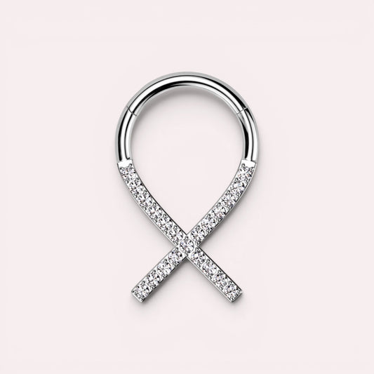 MKBodyJewelry silver titanium septum clicker ring with clear gems in a criss-cross design, 16g