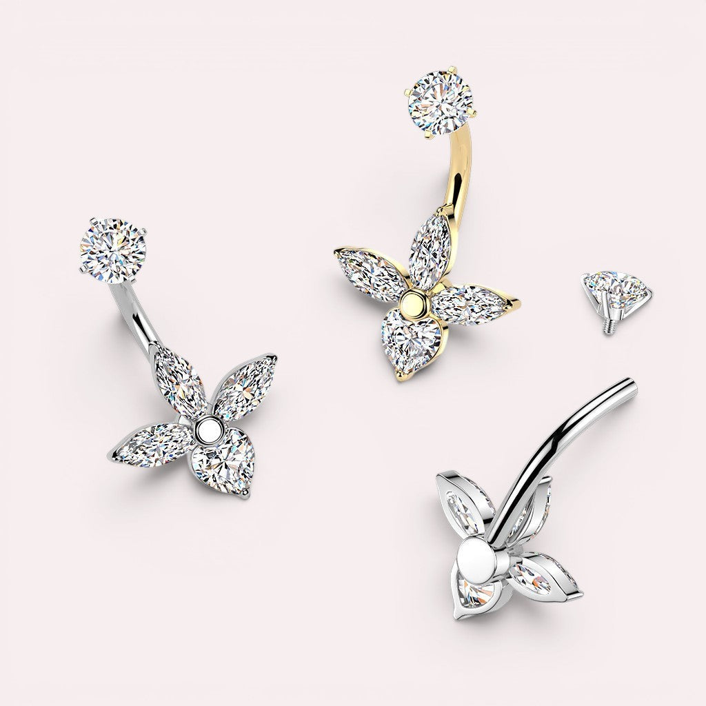 MKBodyJewelry sparkling flower belly button ring with cubic zirconia in silver and gold tones.