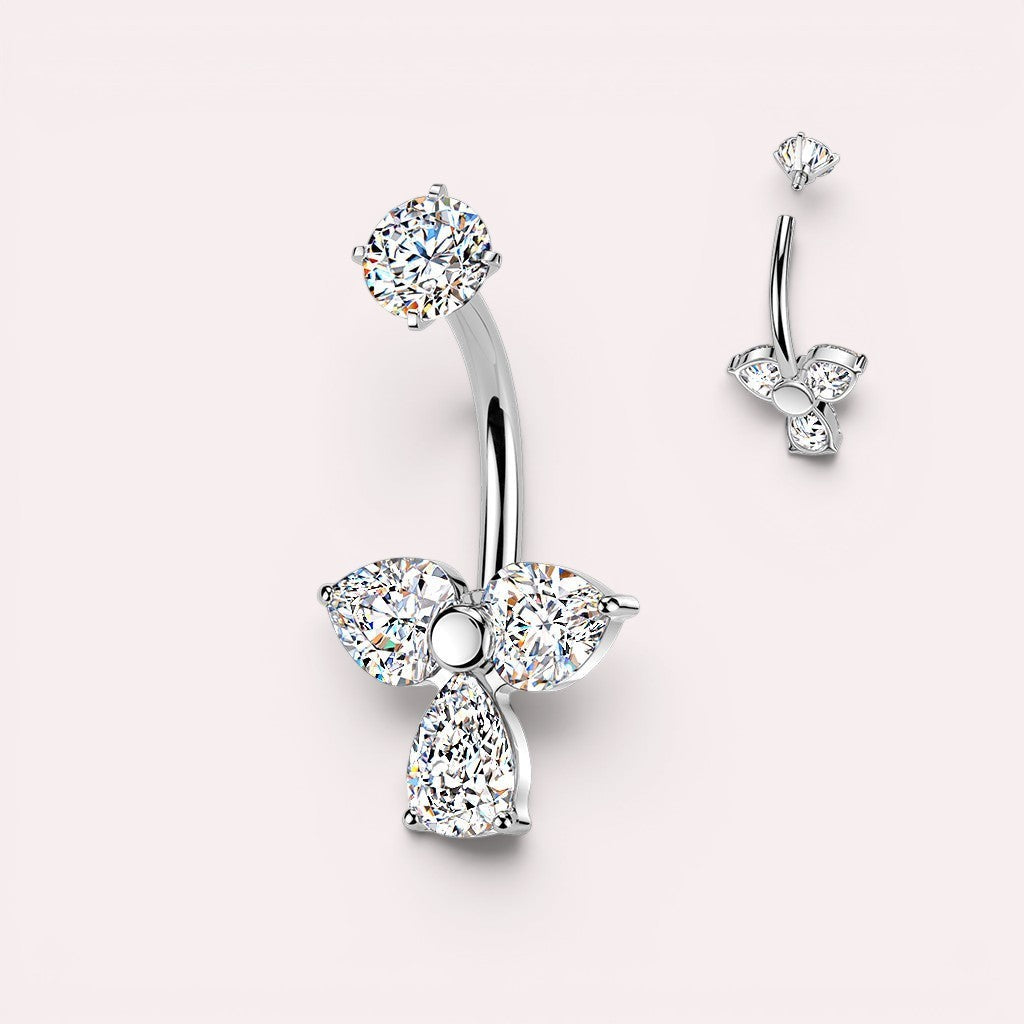 MKBodyJewelry sparkling floral belly button ring with cubic zirconia gems in silver-tone surgical stainless steel.