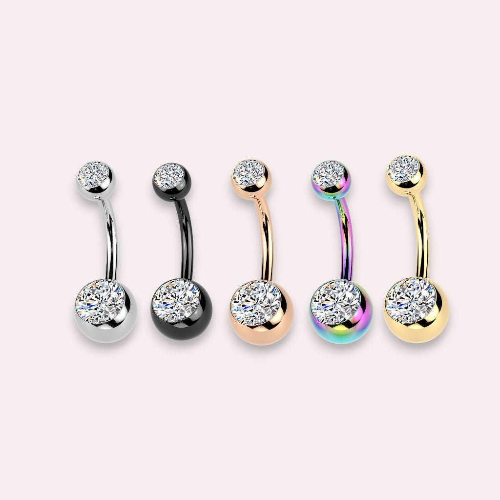 MKBodyJewelry titanium belly button rings with double CZ jewels in silver, black, rose gold, oil slick, and gold.