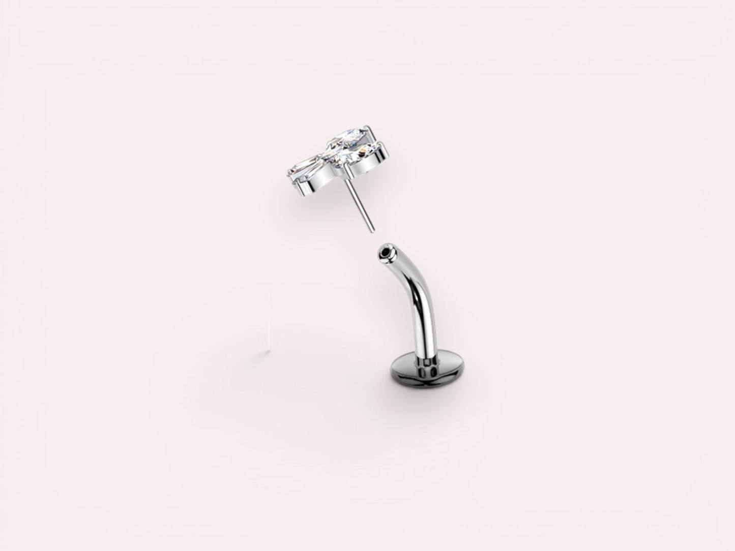 MKBodyJewelry titanium gold bow threadless push in belly ring with clear cubic zirconia. 14G, 10mm barbell.