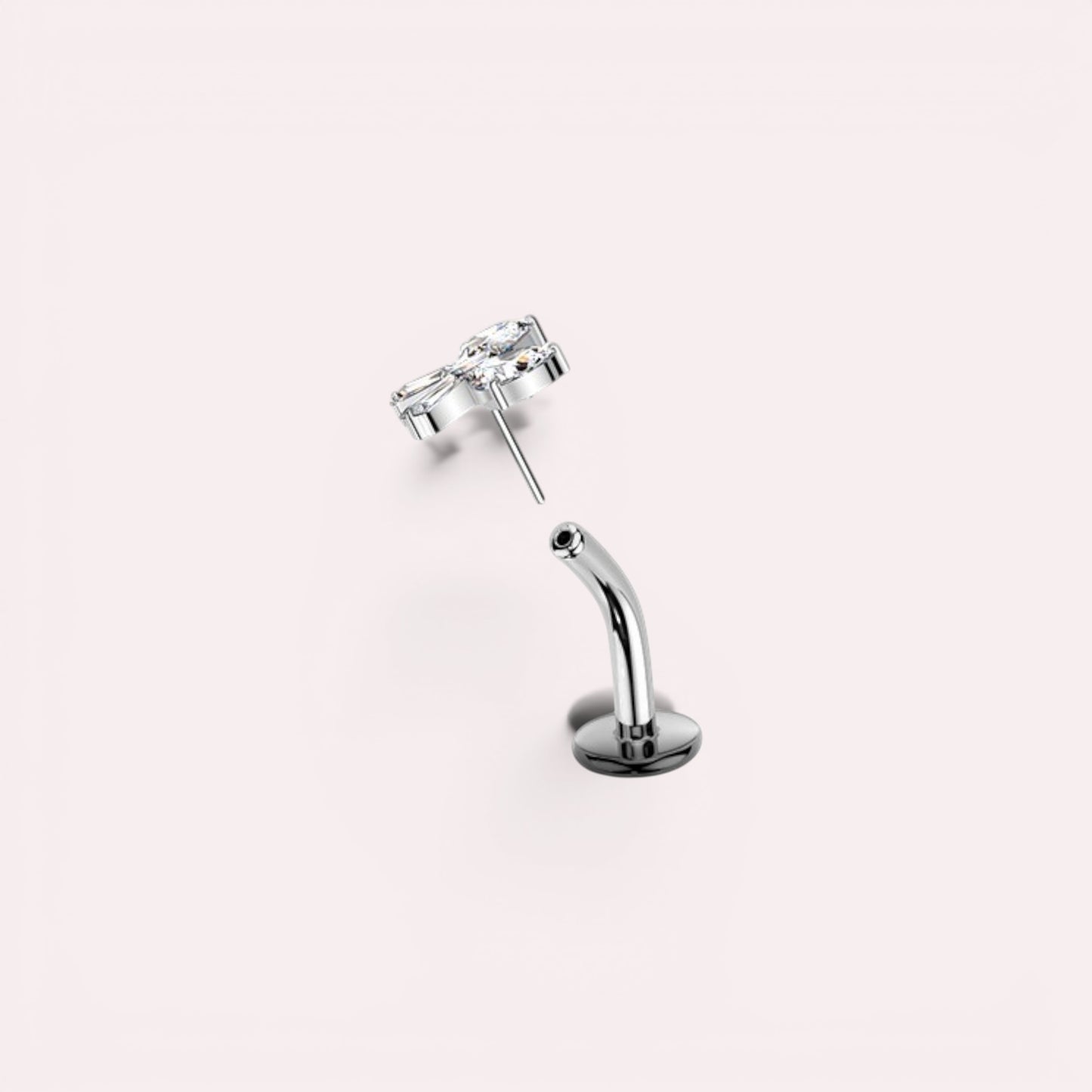 MKBodyJewelry titanium gold bow threadless push in belly ring with clear cubic zirconia. 14G, 10mm barbell.