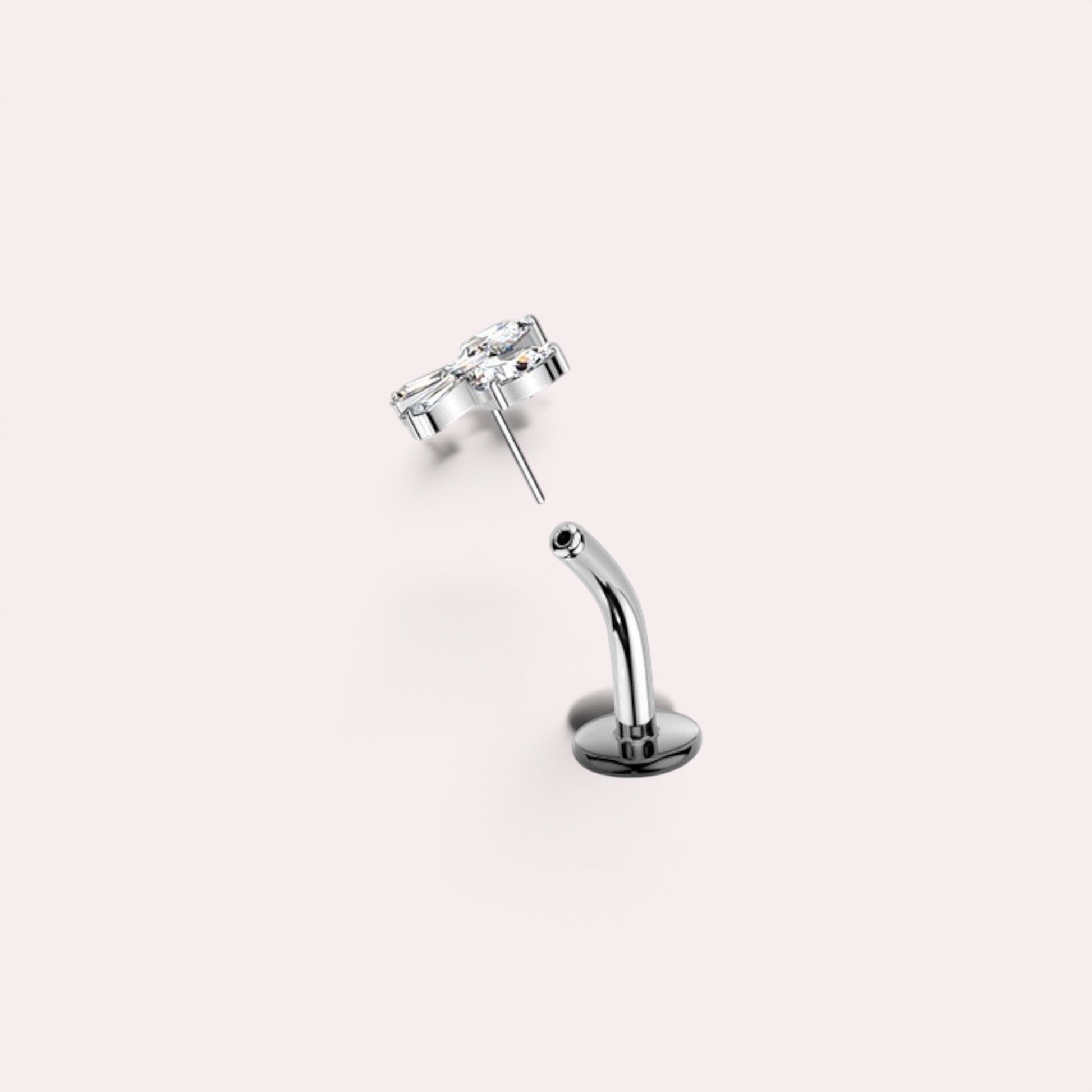 MKBodyJewelry titanium gold bow threadless push in belly ring with clear cubic zirconia. 14G, 10mm barbell.