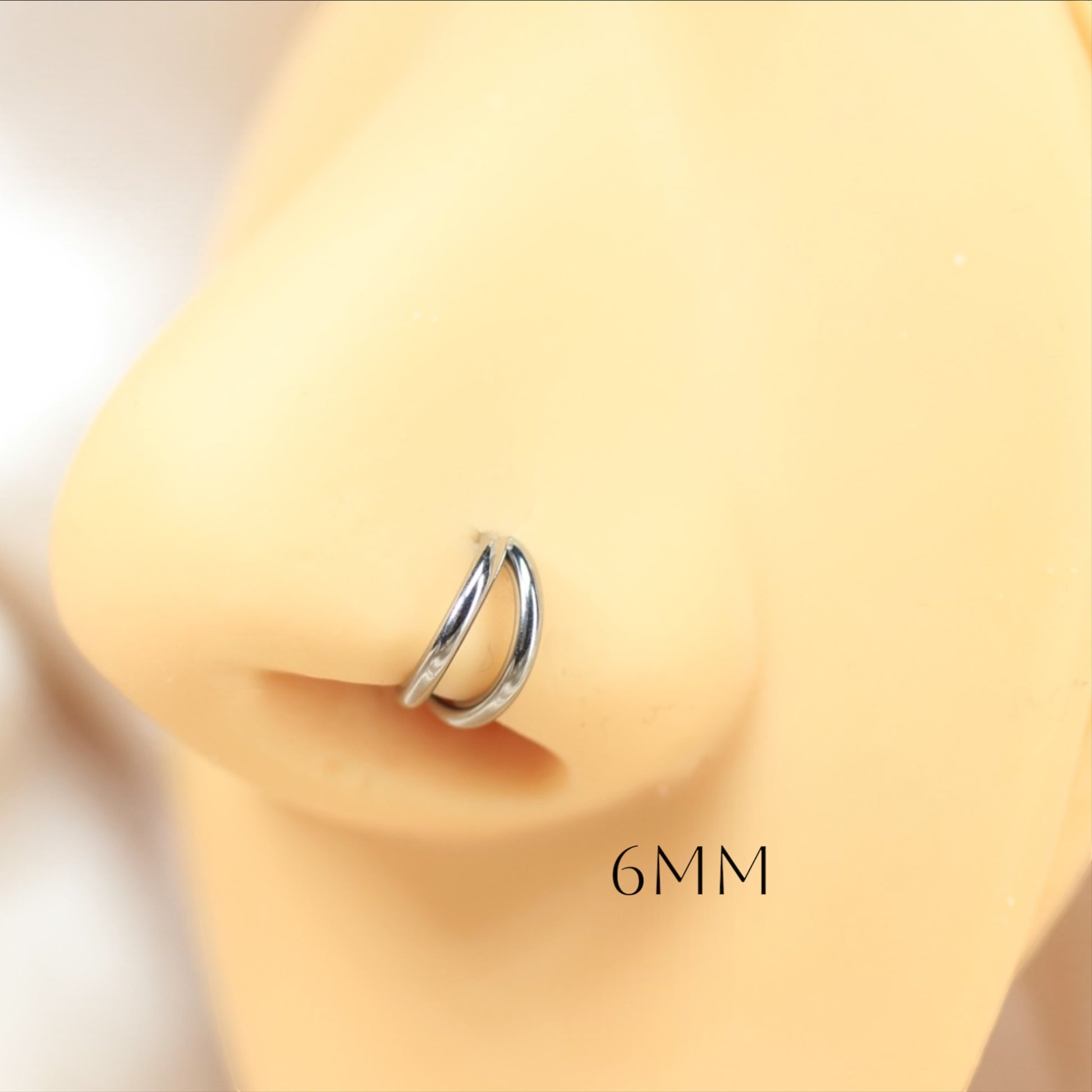 MKBodyJewelry 20g titanium double line nose clicker ring in silver, featuring a minimalist snug fit hoop design.