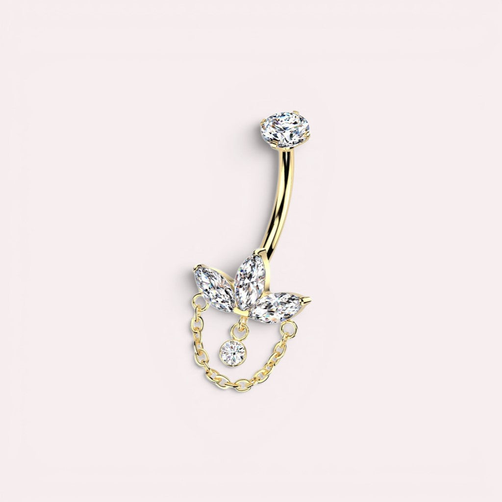 MKBodyJewelry 14g titanium belly rings with floral marquise gems and dangling chains in gold and silver tones.