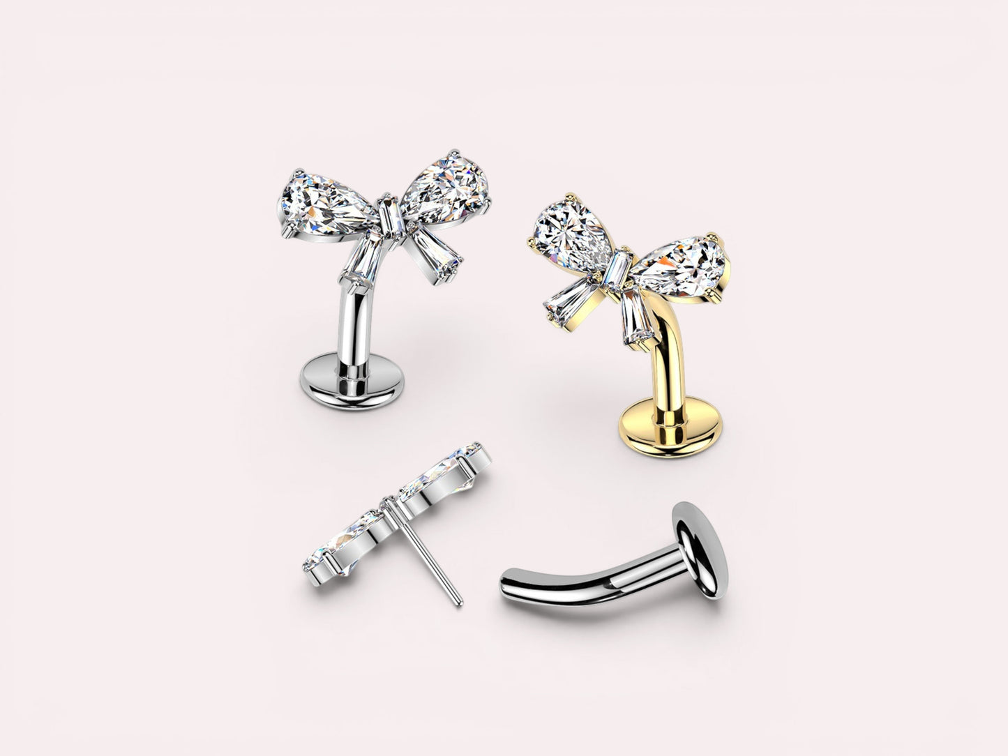 MKBodyJewelry dainty titanium gold bow belly ring with clear crystals. Threadless push-in design, 14G.