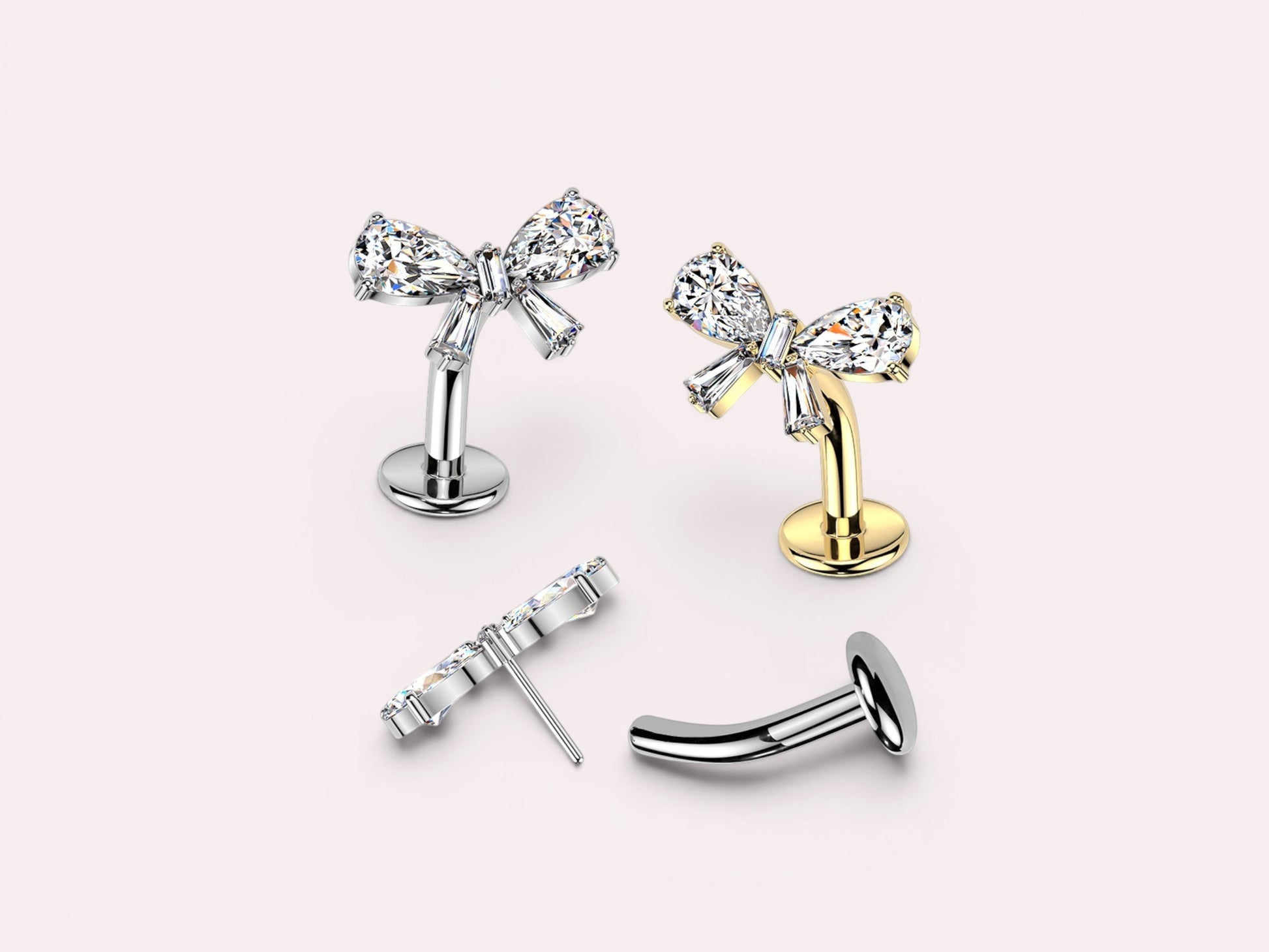 MKBodyJewelry dainty titanium gold bow belly ring with clear crystals. Threadless push-in design, 14G.