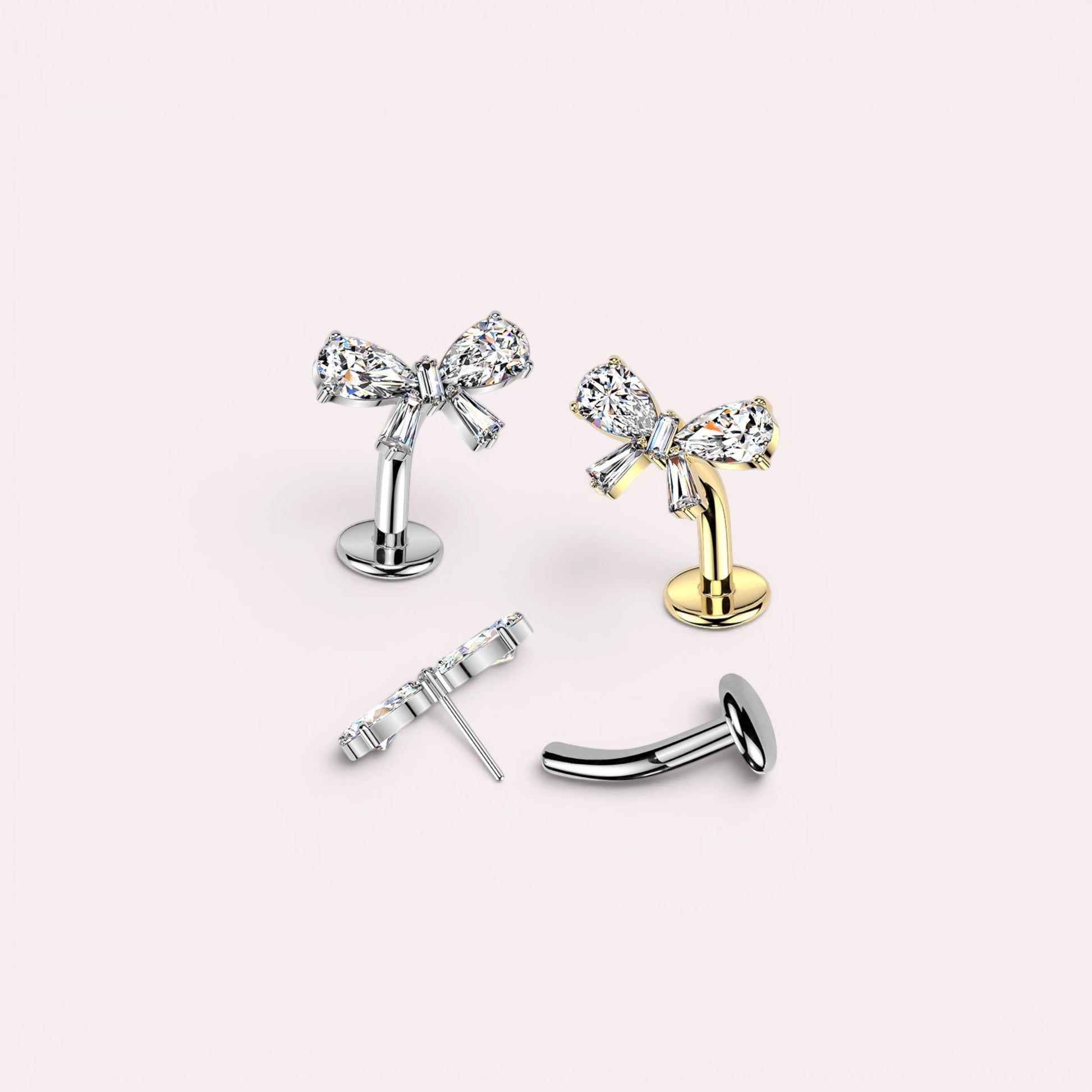 MKBodyJewelry dainty titanium gold bow belly ring with clear crystals. Threadless push-in design, 14G.
