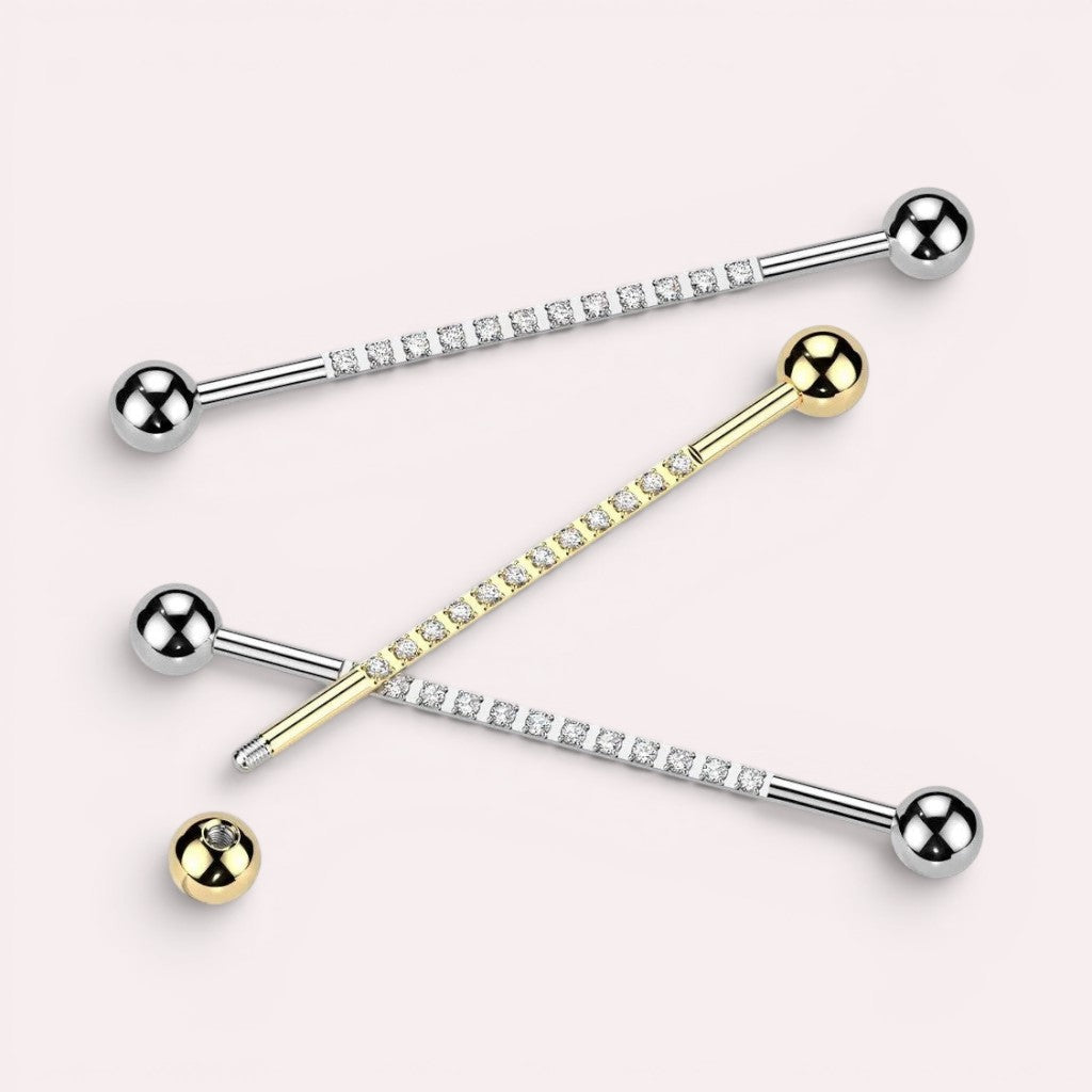 MKBodyJewelry 14G gold titanium industrial barbell with clear CZ gems and silver barbell with clear CZ gems.