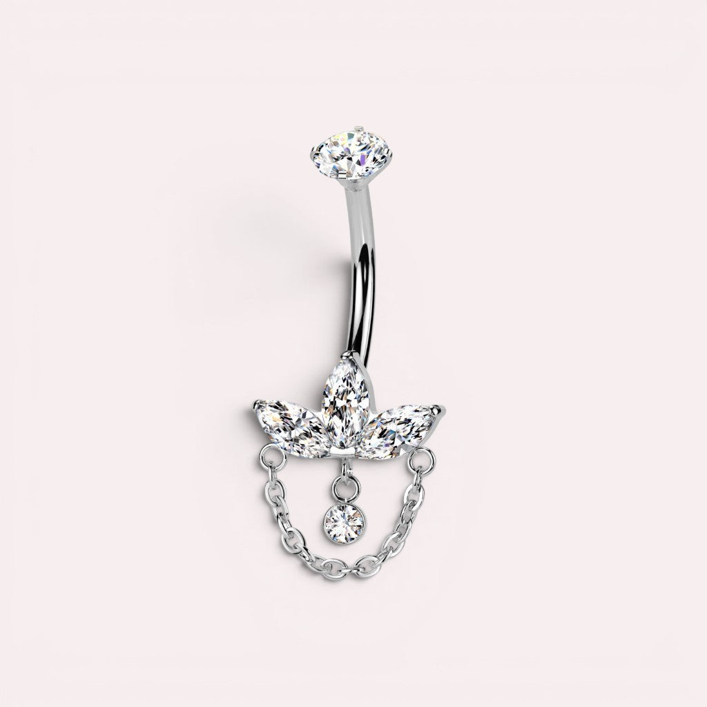 MKBodyJewelry 14g titanium belly button ring featuring a floral lotus design with marquise gems and a dangling chain.