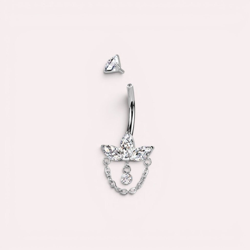 MKBodyJewelry 14g titanium belly button ring featuring a floral lotus design with marquise gems and a dangling chain.