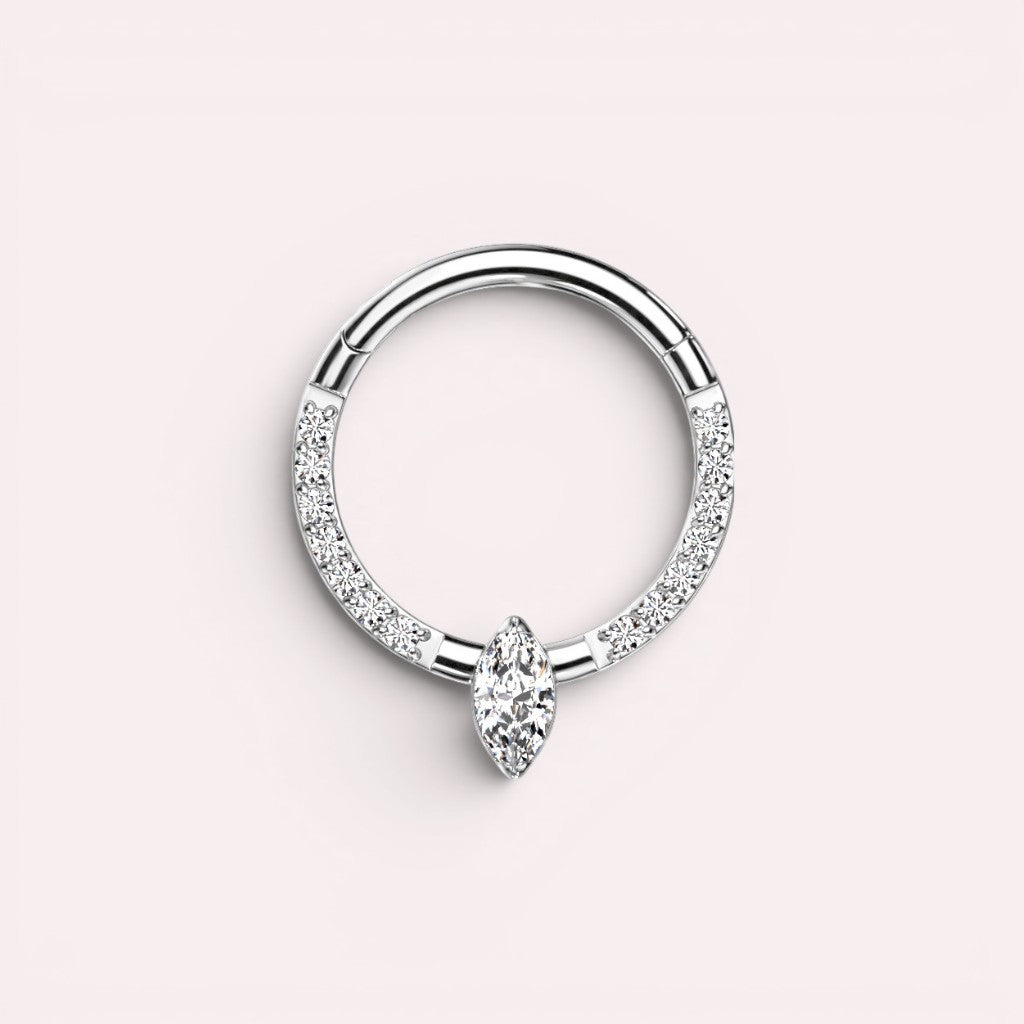 MKBodyJewelry 16g titanium septum clicker ring with a marquise cut center gem and pavé accents.
