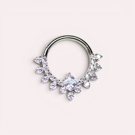 MKBodyJewelry 16g titanium septum clicker ring featuring a central princess-cut CZ stone and sparkling accent gems.